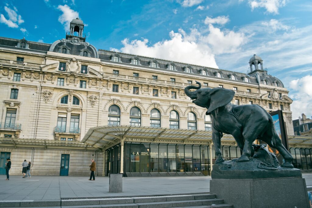 a statue of an elephant in front of Orsay Museum